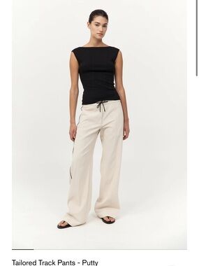 St. Agni Cream Wide-Leg Track Pants with Black Piping